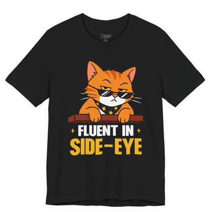 Funny cat t-shirt with Fluent in Side-Eye slogan and sunglasses cat graphic on black shirt