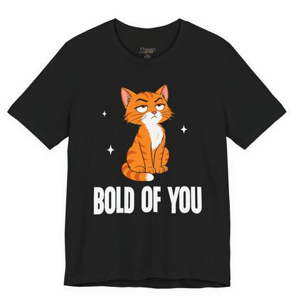 Snarky cat t-shirt with Bold of You slogan and seated orange cat graphic on black shirt