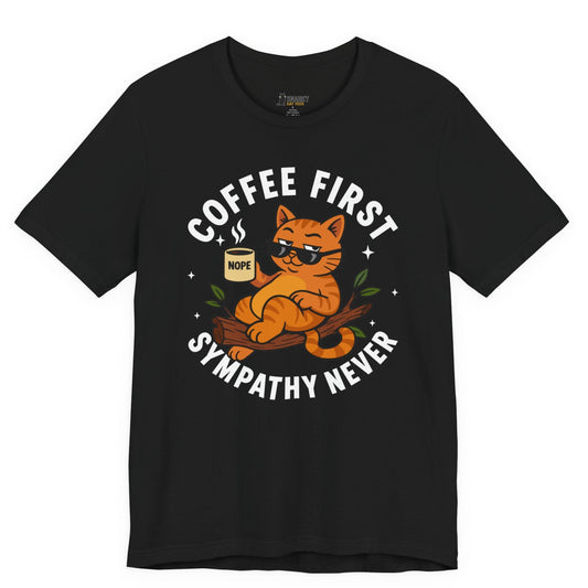 Funny cat t-shirt with Coffee First Sympathy Never slogan and lounging cat graphic on black shirt