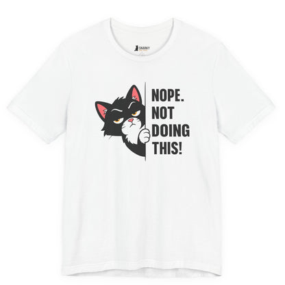 Funny cat t-shirt with Nope Not Doing This slogan and black peeking cat graphic on white shirt