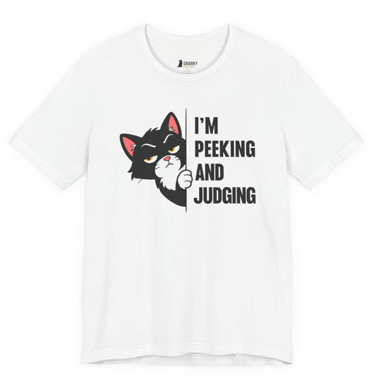 Snarky cat t-shirt with I’m Peeking and Judging slogan and black peeking cat graphic on white shirt
