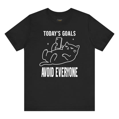 Introvert cat shirt with Today’s Goals Avoid Everyone slogan and phone cat graphic on black shirt