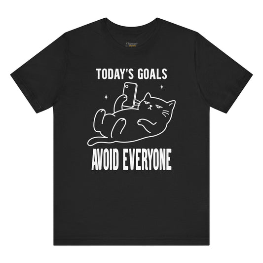 Introvert cat shirt with Today’s Goals Avoid Everyone slogan and phone cat graphic on black shirt
