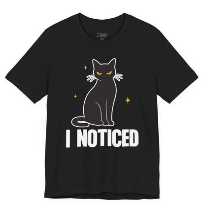 Snarky cat t-shirt with I Noticed slogan and black cat graphic on black shirt