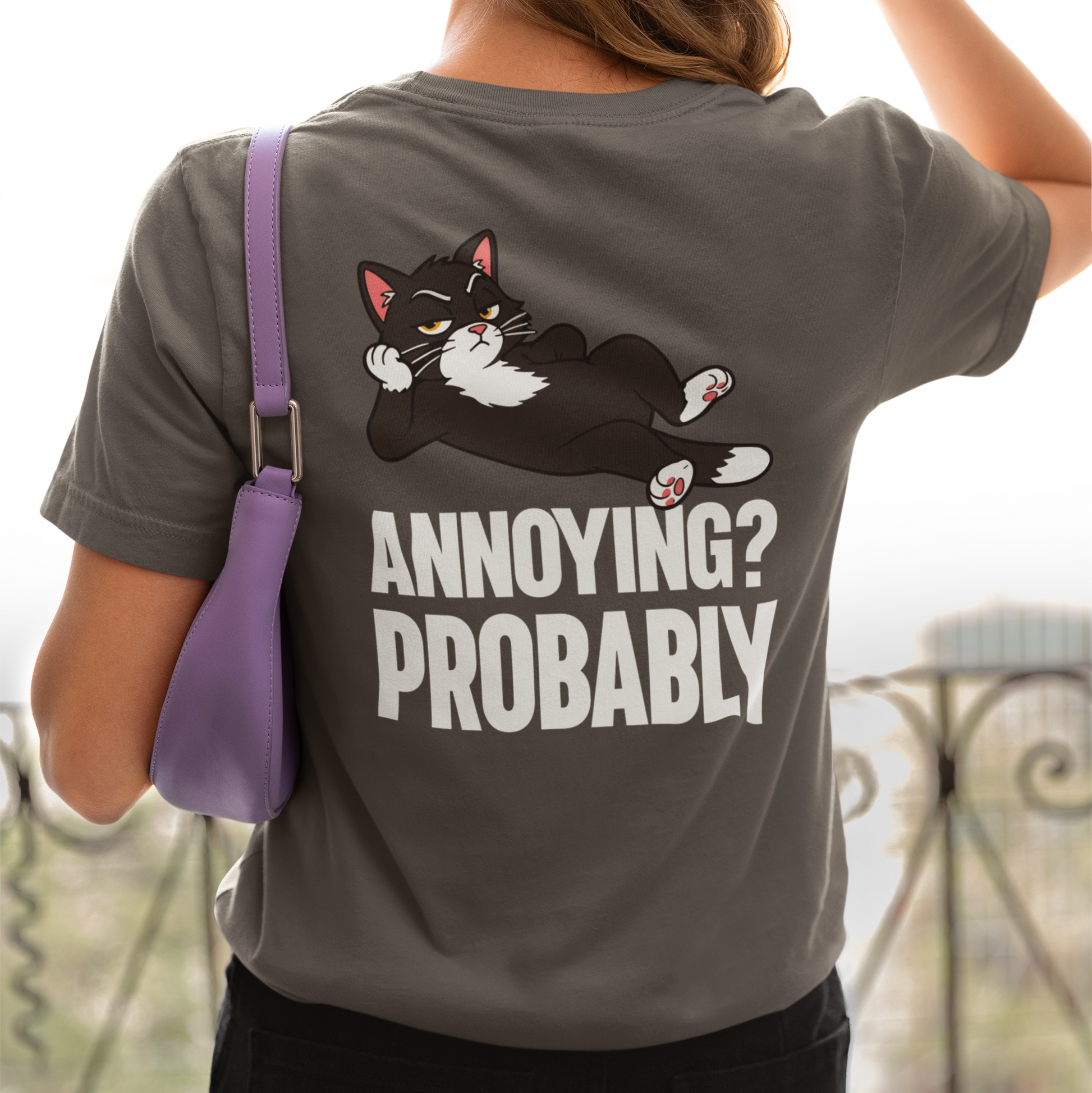 Model wearing Annoying? Probably Lounging Cat T-Shirt with black cat back print design