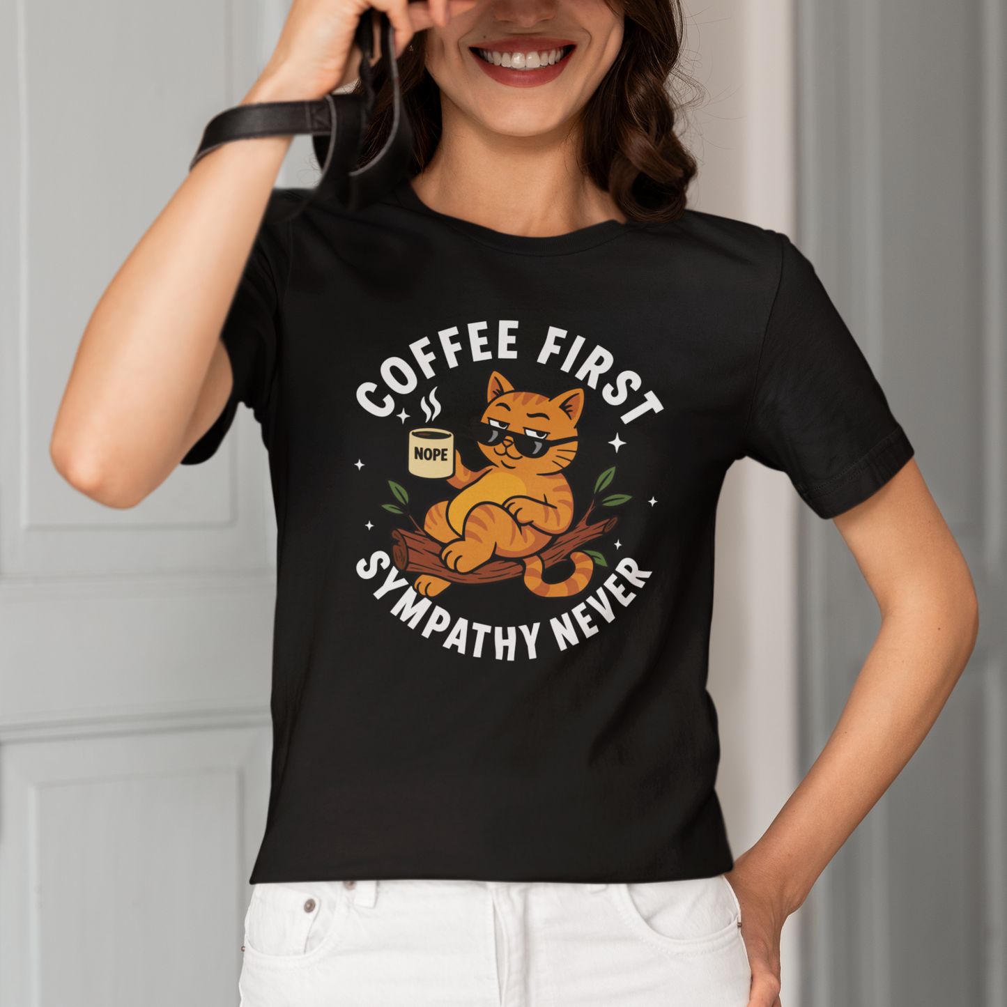 Model wearing Coffee First Sympathy Never Lounging Cat T-Shirt with coffee cat graphic design