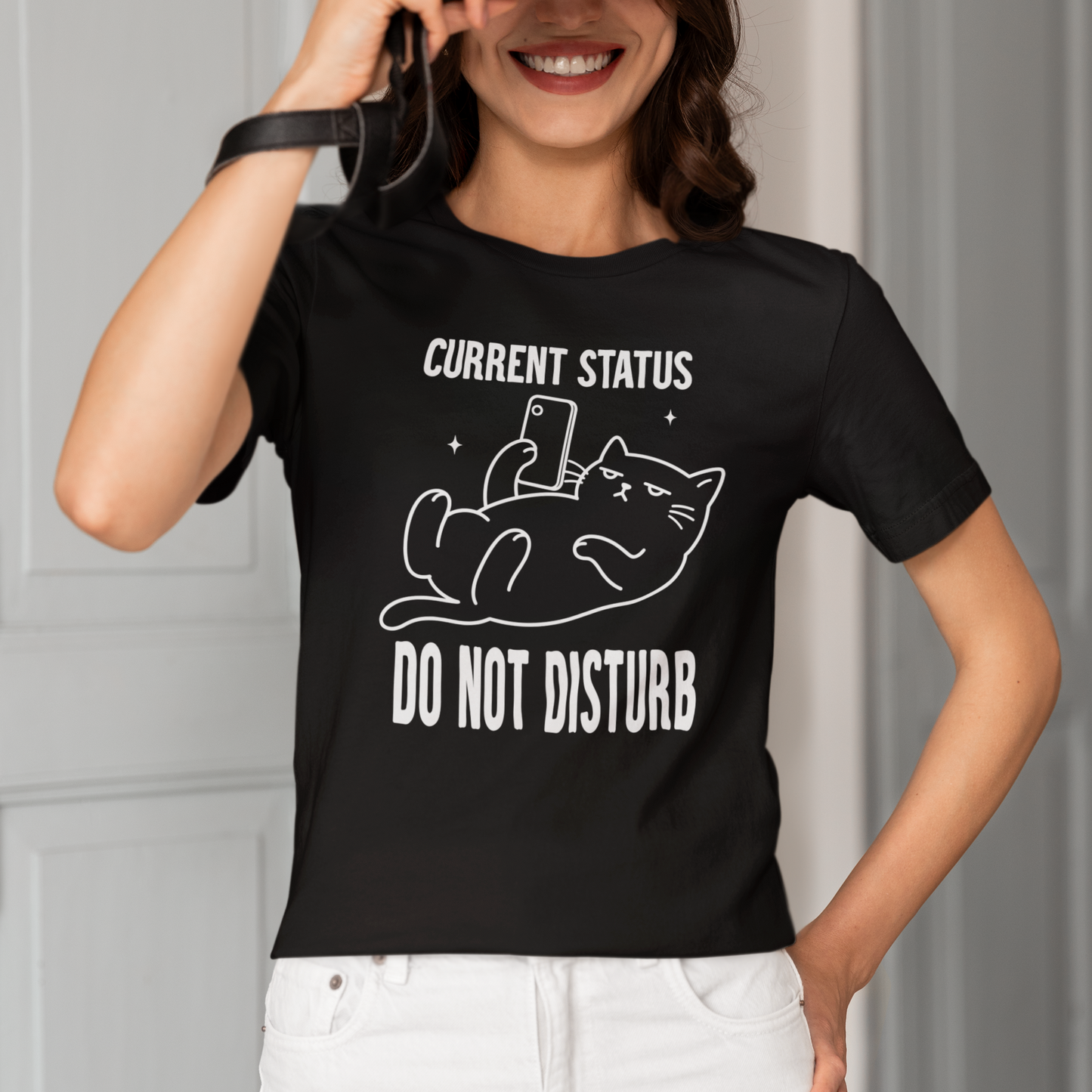Model wearing Do Not Disturb Phone Cat T-Shirt with white phone cat graphic design