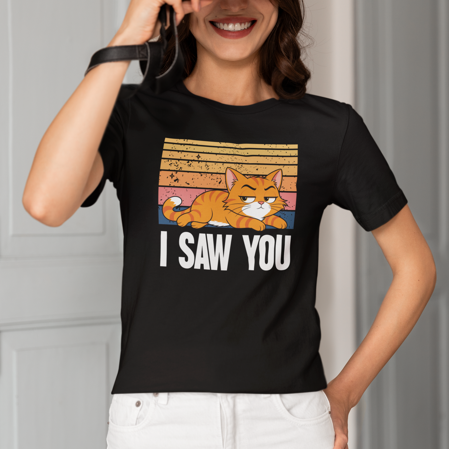 Model wearing I Saw You Judgy Cat T-Shirt with retro orange cat graphic design