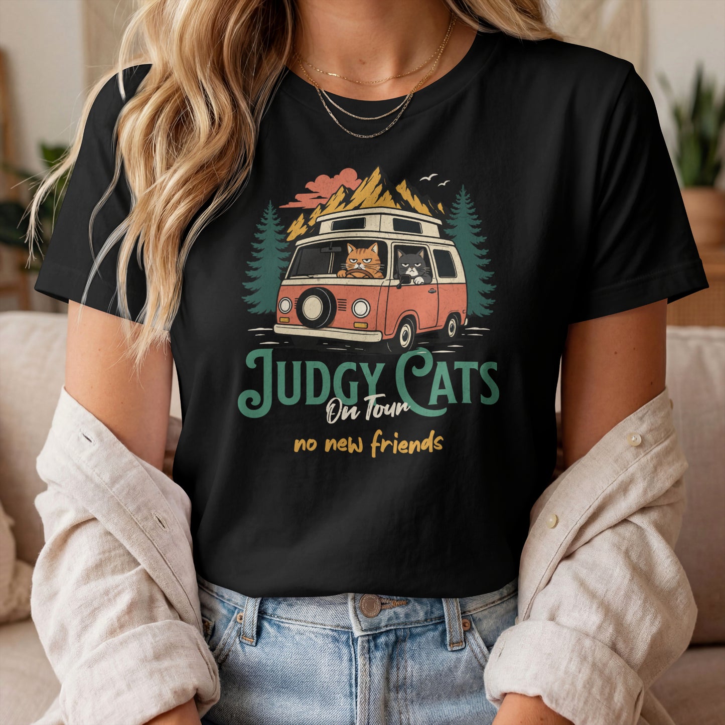 Model wearing No New Friends Van Cats T-Shirt with road trip cat graphic design