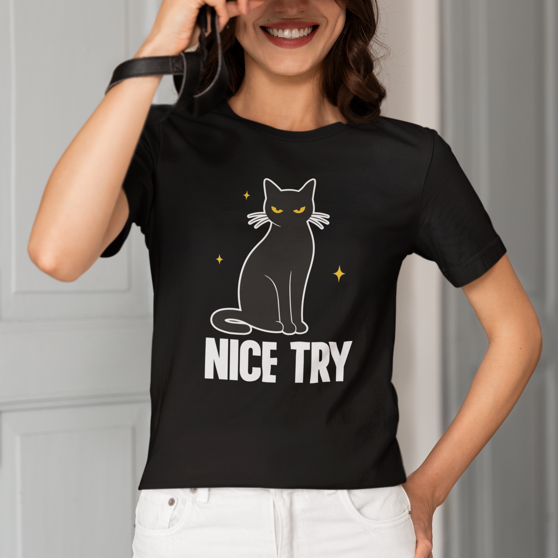 Model wearing Nice Try Judgy Cat T-Shirt with black cat graphic design