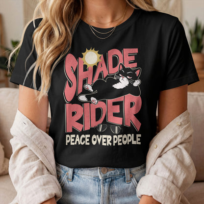 Model wearing Peace Over People Shade Rider Cat T-Shirt with lounging cat graphic design